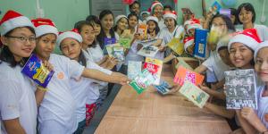 Children are happy with donated books