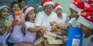 Children are happy with donated books